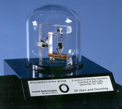 A close-up of a replica of the first point-contact transistor.
